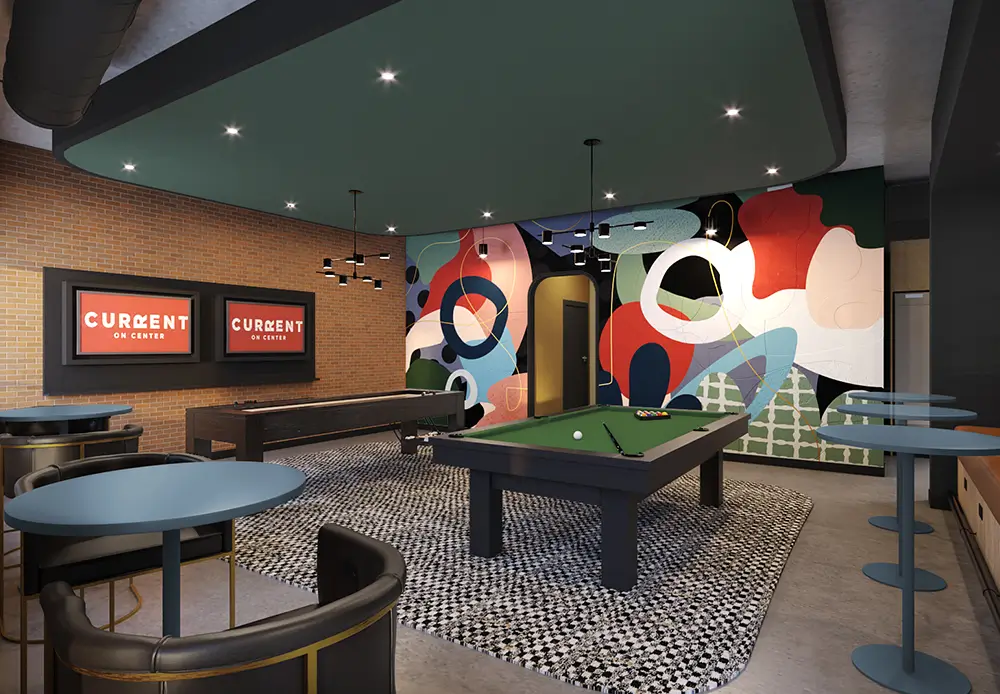 Game lounge with billiards table and mural