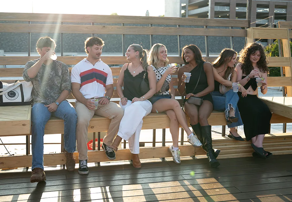 Residents on the rooftop deck